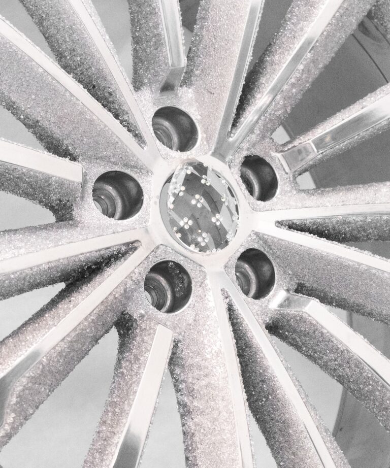 Aluminum wheel disk inlaid with crystals shines at show