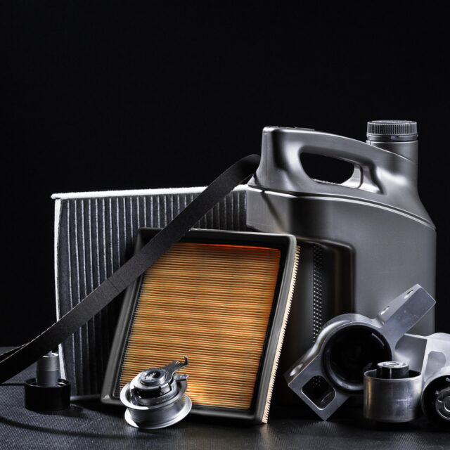 New car parts on a dark background