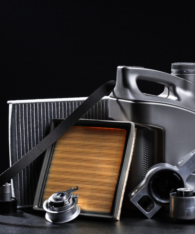 New car parts on a dark background