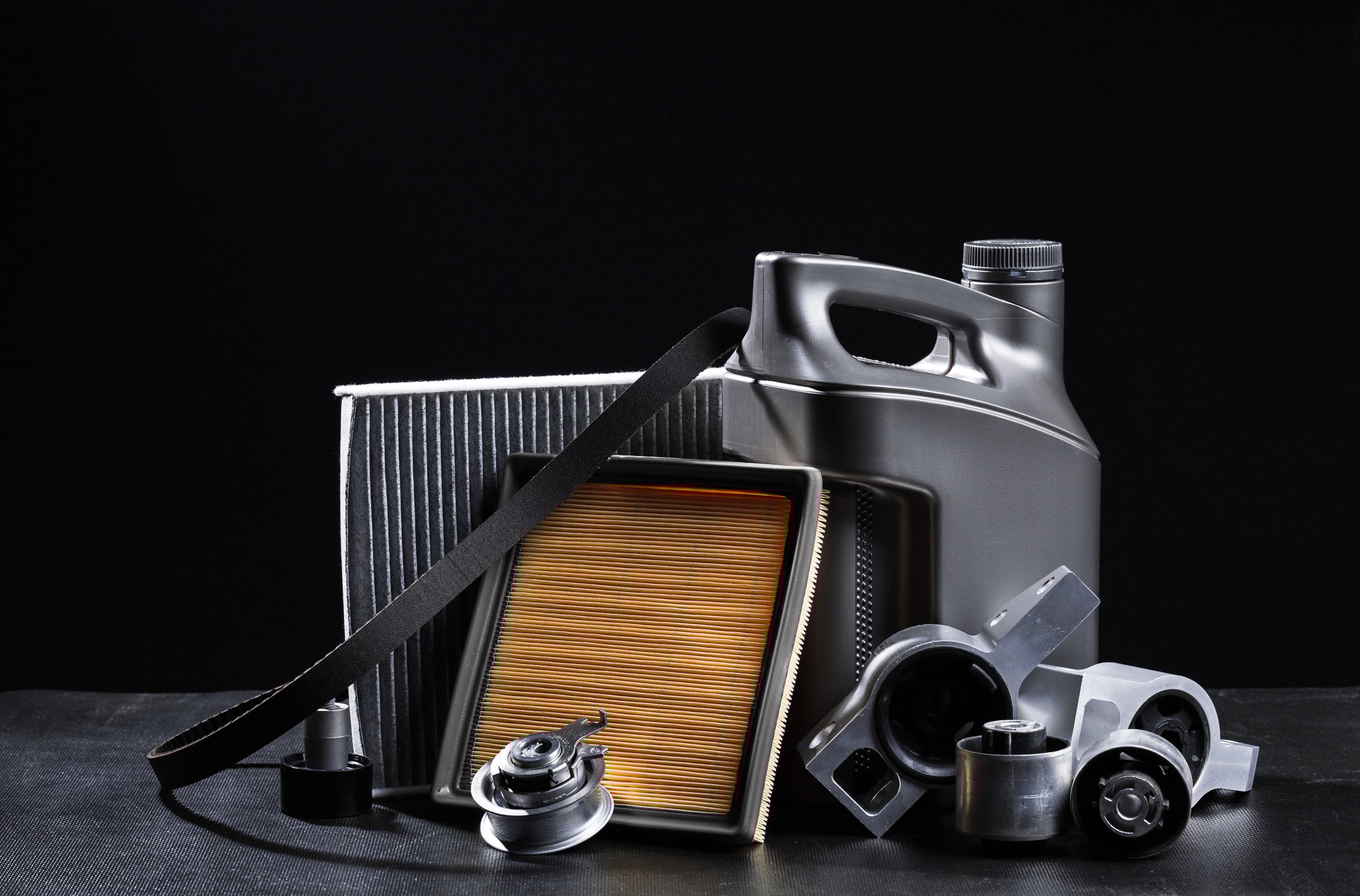 New car parts on a dark background